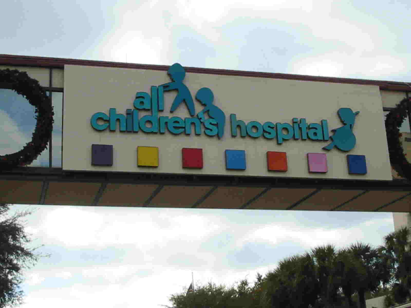 Sign of All Children's Hospital on an overpass above the street